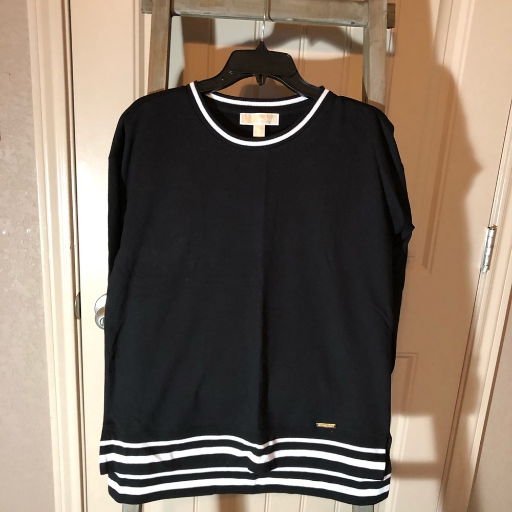 Michael Kors black top with white trim.